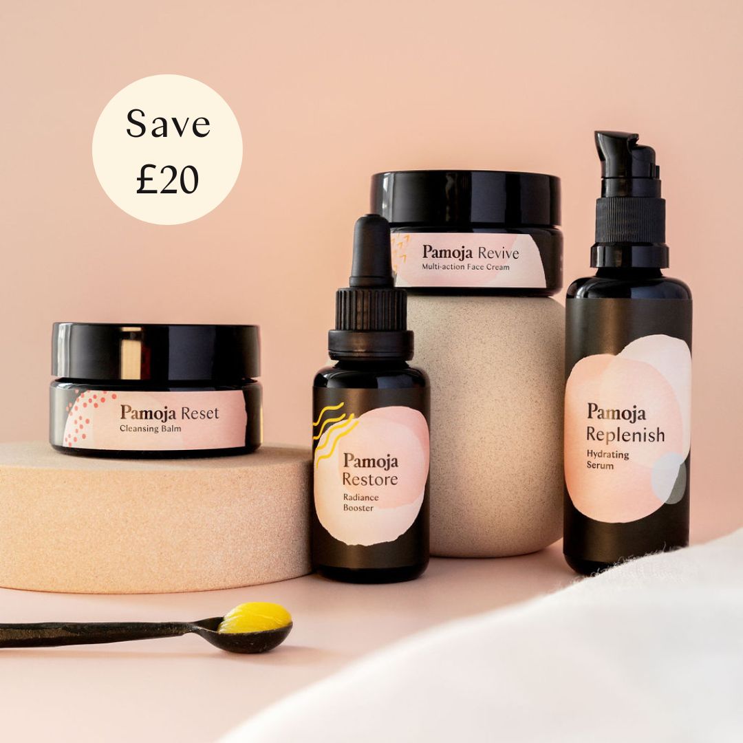 IMAGE OF PAMOJA 4-STEP NATURAL SKINCARE PRODUCTS WITH CLOTH AND VISIBLE TEXTURES INCLUDING RESET CLEANSING BALM, ORGANIC COTTON MUSLIN CLOTH , REPLENISH HYDRATING SERUM, REVIVE MULTI-ACTION FACE CREAM, RESTORE RADIANCE BOOSTER, FOR DRY SENSITIVE SKIN PERIMENOPAUSE, VEGAN AND CRUELTY FREE